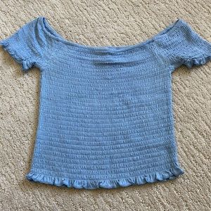 Robbed blue cropped off the shoulder